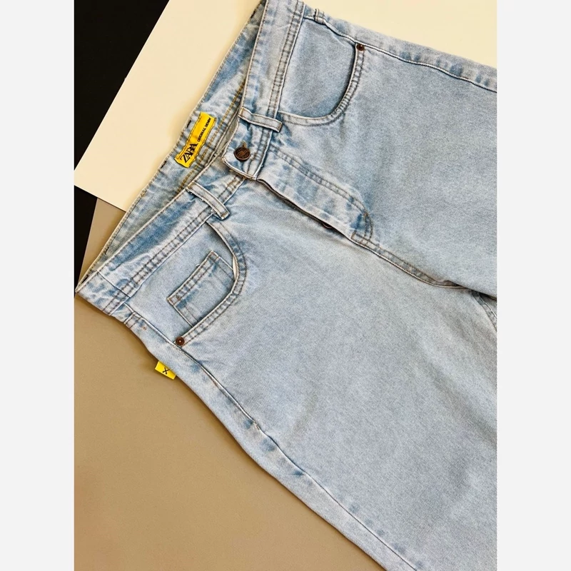 شلوار لی مام فیت آبی روشن مردانه با فاق بلند و دوخت تمیز