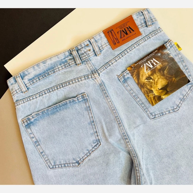 شلوار لی مام فیت آبی روشن مردانه با فاق بلند و دوخت تمیز