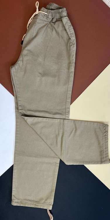 شلوار اسلش کتان مردانه کرم روشن مدل نیمبگ با پاچه گتدار