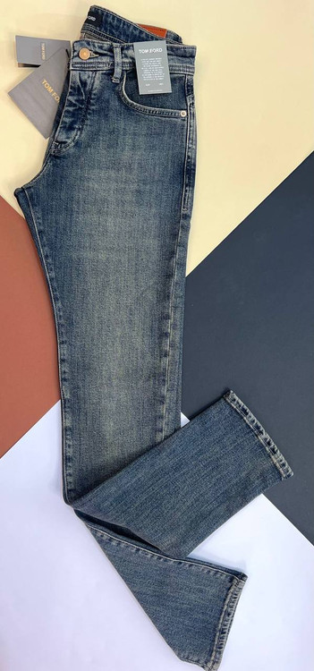 شلوار جین مردانه تام فورد مدل راسته آبی کلاسیک سنگشور با هاله کرم طلایی