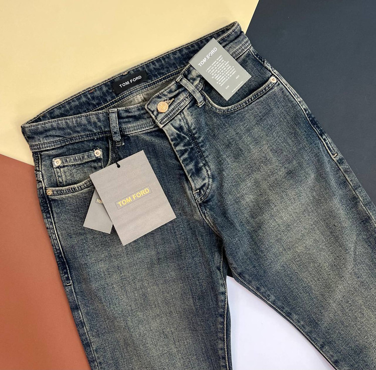 شلوار جین مردانه تام فورد مدل راسته آبی کلاسیک سنگشور با هاله کرم طلایی