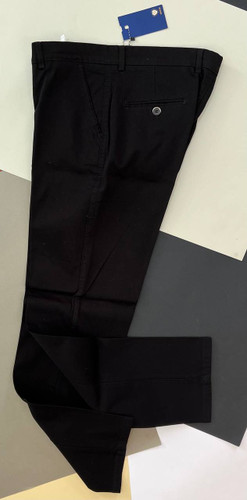 شلوار مردانه کلاسیک از جنس کتان جودوندار با طراحی رسمی و بسته شدن دکمه و زیپ