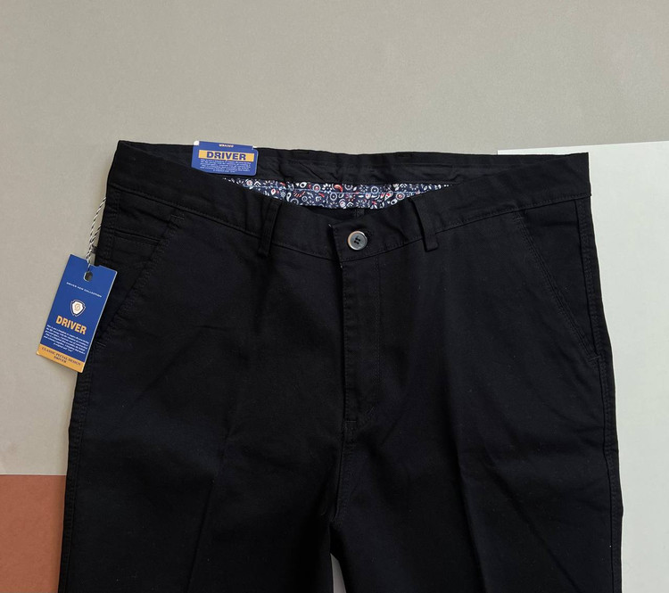 شلوار مردانه کلاسیک از جنس کتان جودوندار با طراحی رسمی و بسته شدن دکمه و زیپ